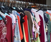 2nd hand sale clothes rack with a selection of fashion for women at thrift store